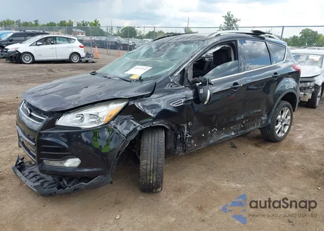 2016 Ford Escape Titanium z USA, uszkodzony, nr VIN 1FMCU9JX9GUC65306